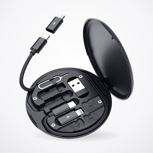 Kit de viaje Zettro abierto: cable USB-C, conector USB, adaptadores, ranuras de chip y pin